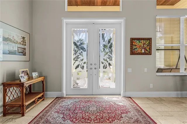 a view of room with window and furniture