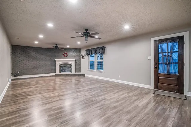 a house view with a backyard space