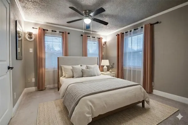 a view of empty room with ceiling fan