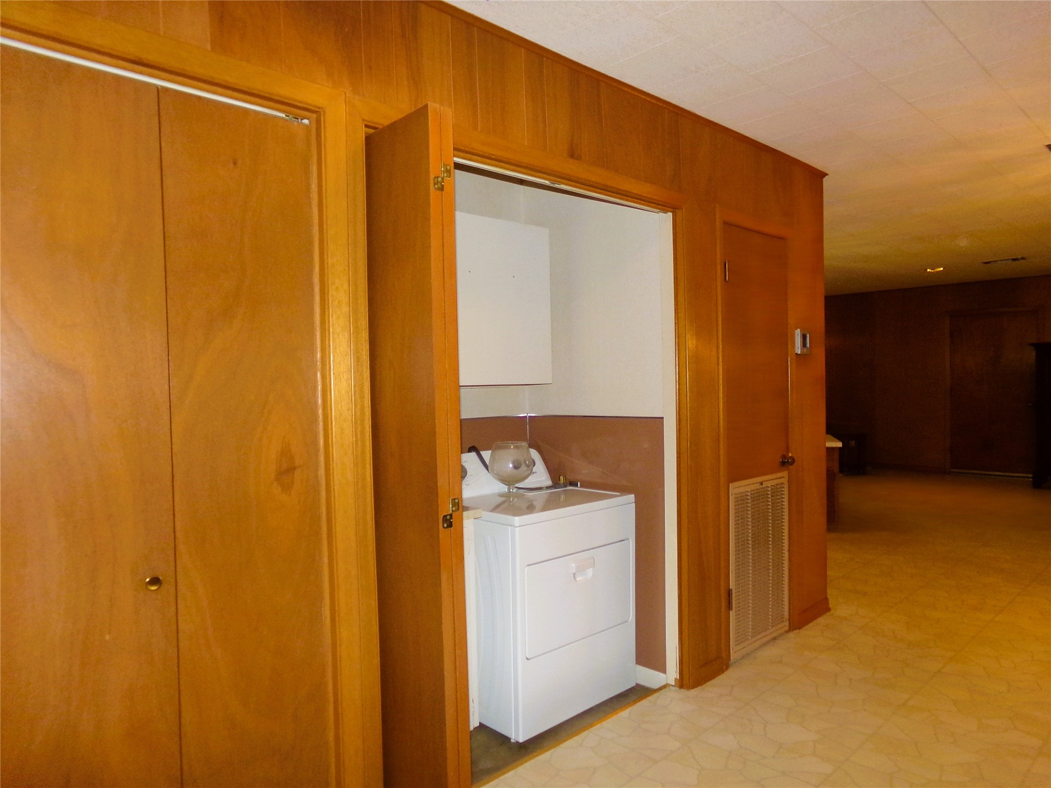 516 North College Street Weimar, TX 78962 - Photo 16 of 20 a bathroom with a granite countertop sink and a mirror