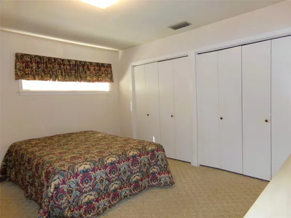 a bathroom with a sink and a shower curtain