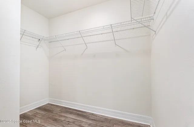 a view of a room with racks on the wall