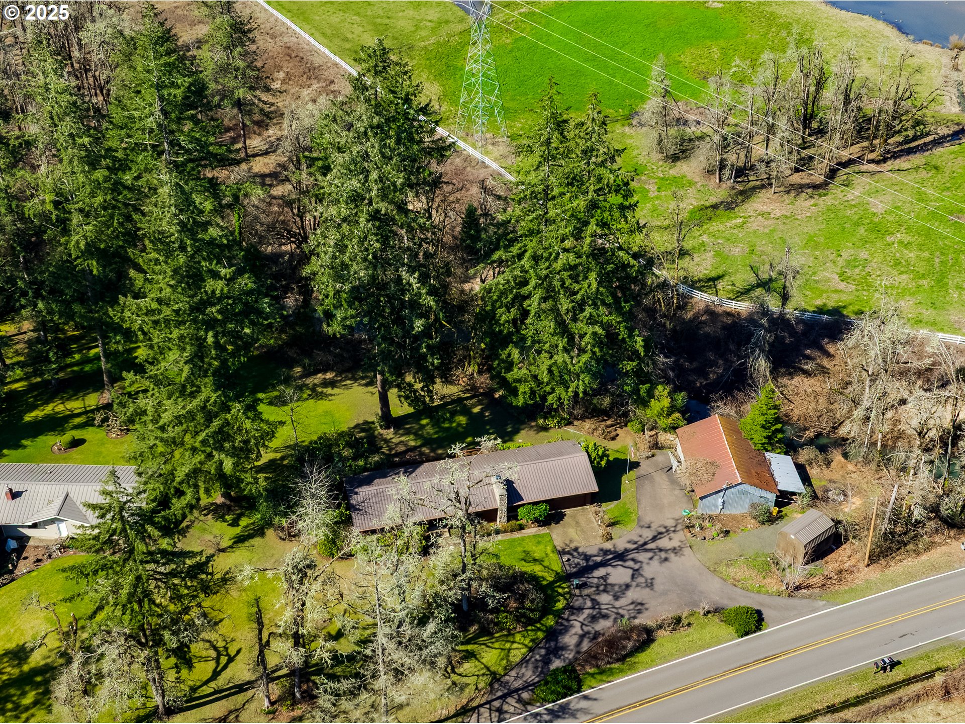 37593 Upper Camp Creek Road Springfield, OR 97478 - Photo 6 of 48 an aerial view of a house with a yard