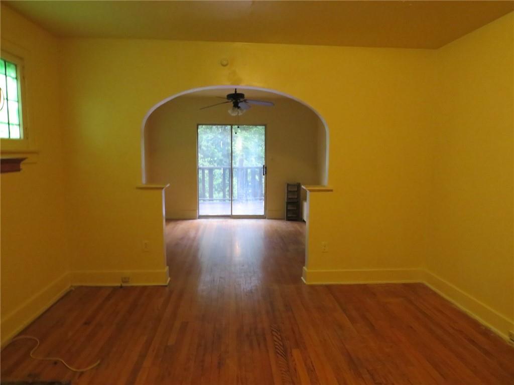 423 Braddock Road Pittsburgh, PA 15221 - Photo 5 of 36 a view of livingroom with furniture and wooden floor