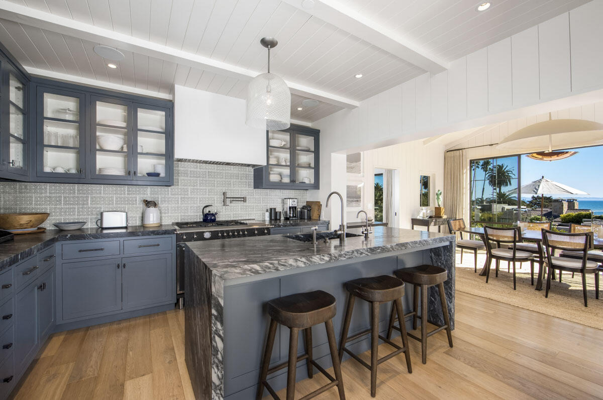 0 Hill Road Santa Barbara, CA 93108 - Photo 17 of 35 a kitchen with stainless steel appliances granite countertop table chairs sink and cabinets