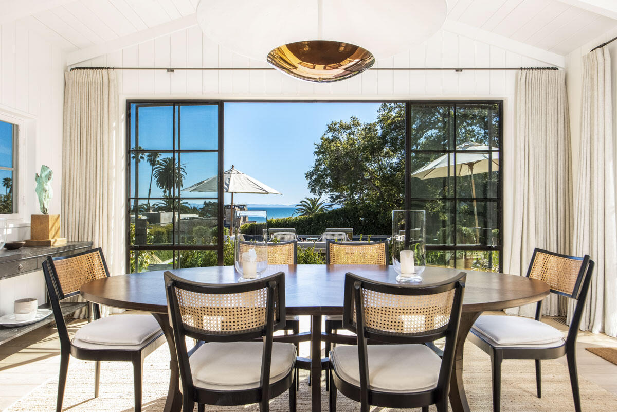 0 Hill Road Santa Barbara, CA 93108 - Photo 19 of 35 a dining room with furniture and a floor to ceiling window