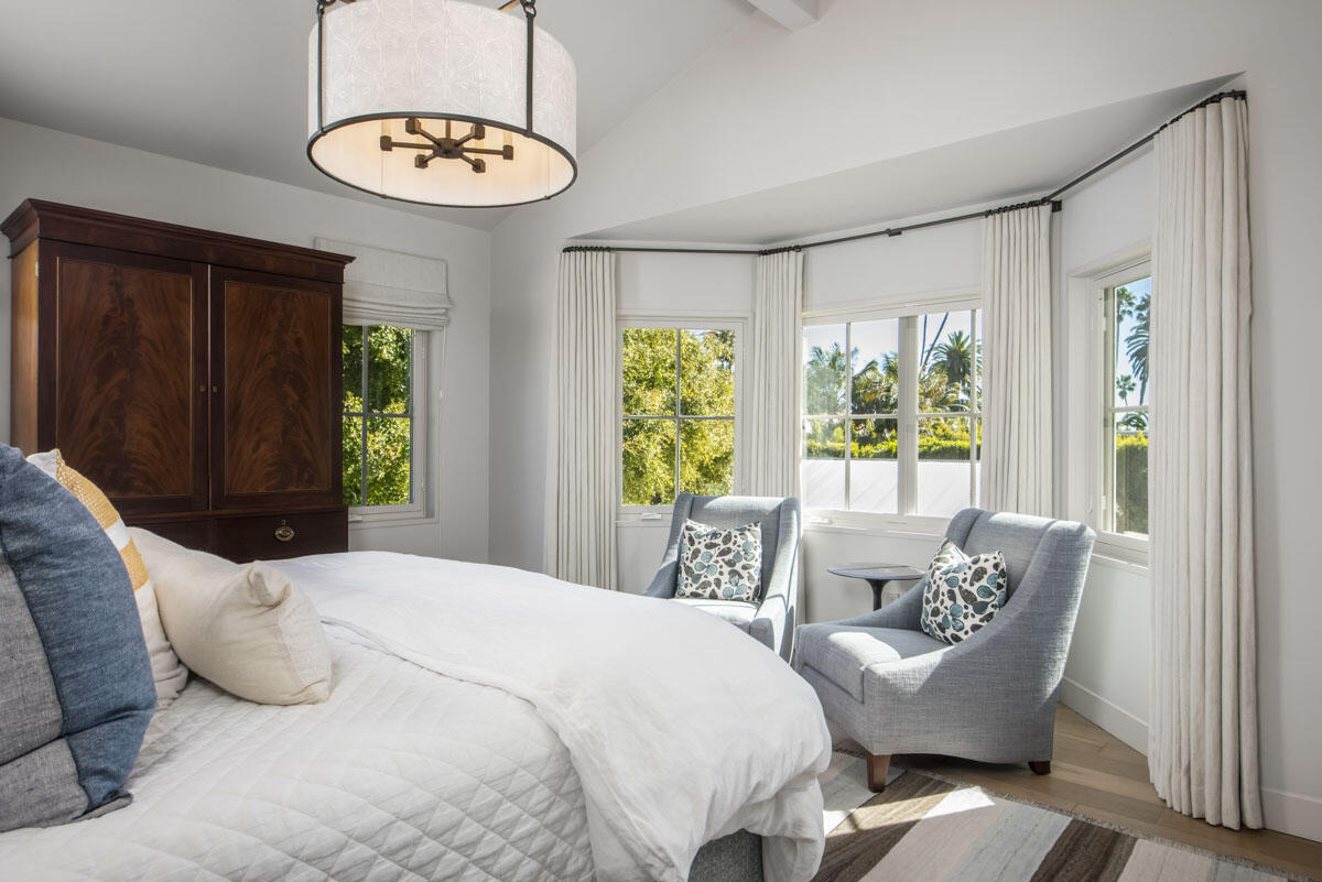 0 Hill Road Santa Barbara, CA 93108 - Photo 32 of 35 a bedroom with a bed and a chandelier