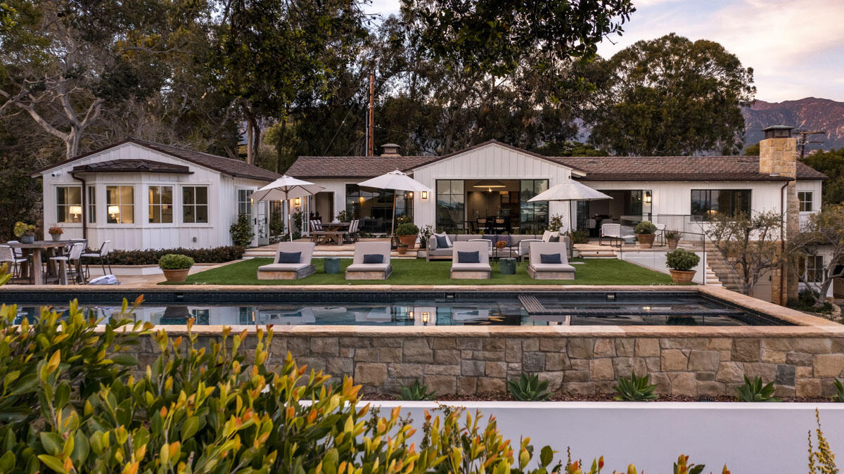 0 Hill Road Santa Barbara, CA 93108 - Photo 5 of 35 a front view of a house with swimming pool and chairs