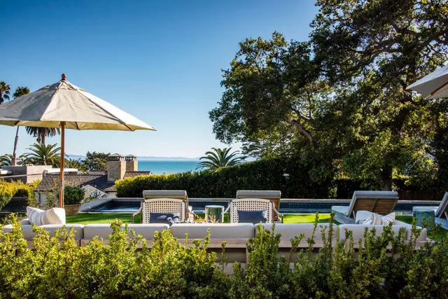 a view of a swimming pool with a patio