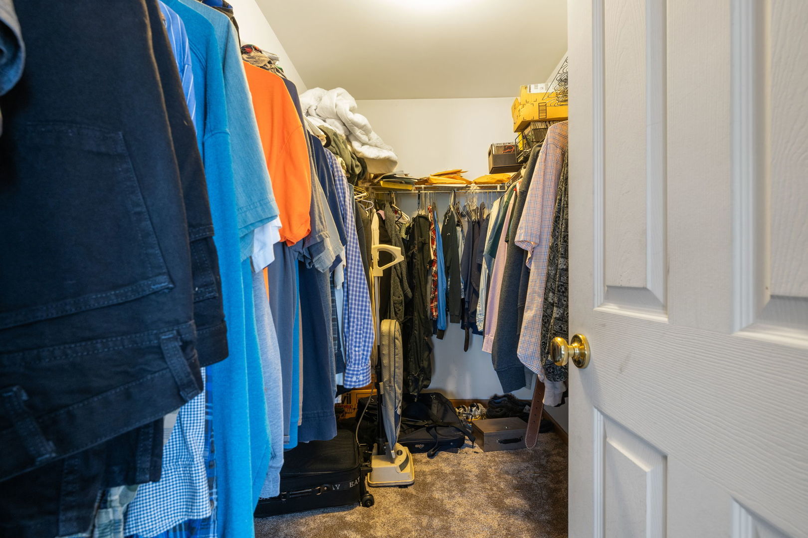 601 Greystone Lane Bolingbrook, IL 60440 - Photo 14 of 20 a view of walk in closet with clothes