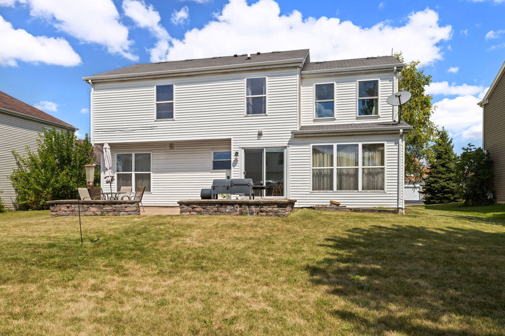 601 Greystone Lane Bolingbrook, IL 60440 - Photo 20 of 20 a house that has a big yard in front of it