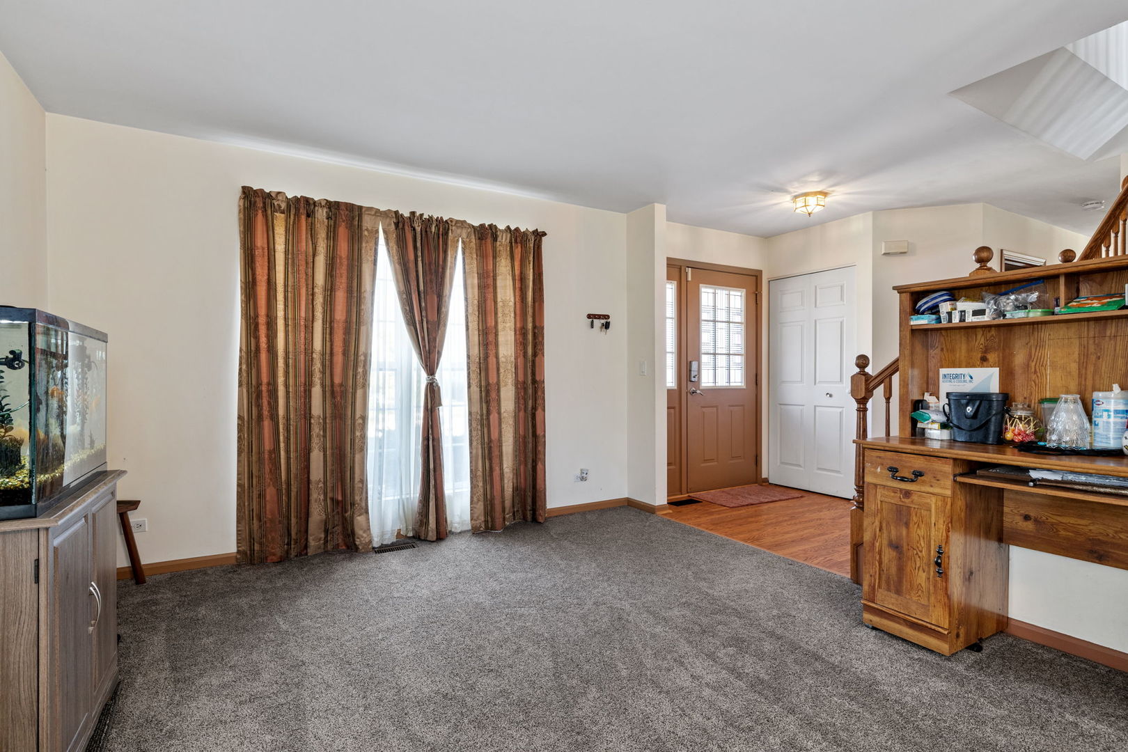 601 Greystone Lane Bolingbrook, IL 60440 - Photo 3 of 20 a view of a room with window and furniture
