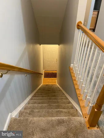 a view of balcony with wooden floor