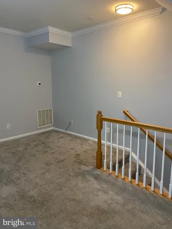 a view of a room with stairs