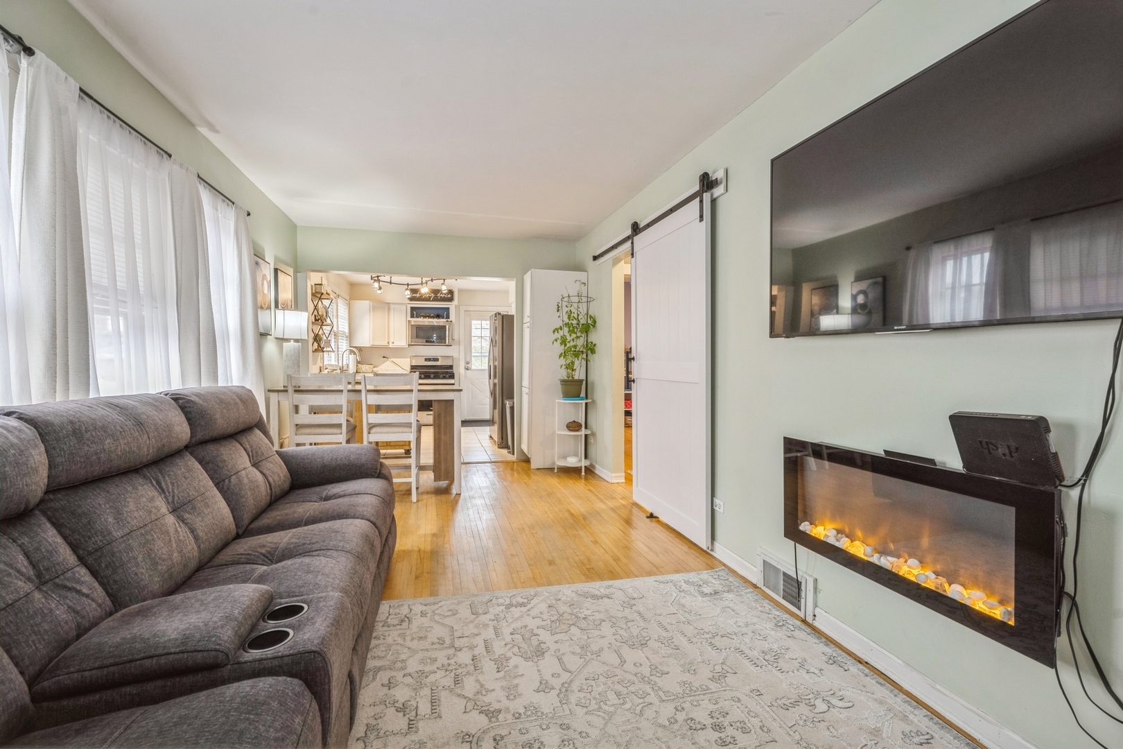 192 East Burlington Street Riverside, IL 60546 - Photo 4 of 23 a living room with furniture and a fireplace