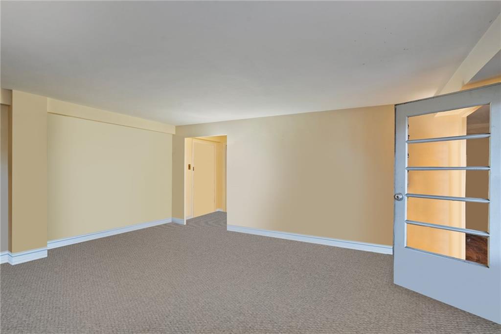 4625 Fifth Avenue, Unit 116 Pittsburgh, PA 15213 - Photo 4 of 25 a view of an empty room with a window