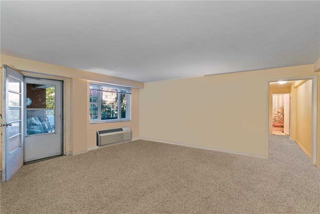 4625 Fifth Avenue, Unit 116 Pittsburgh, PA 15213 - Photo 8 of 25 an empty room with windows