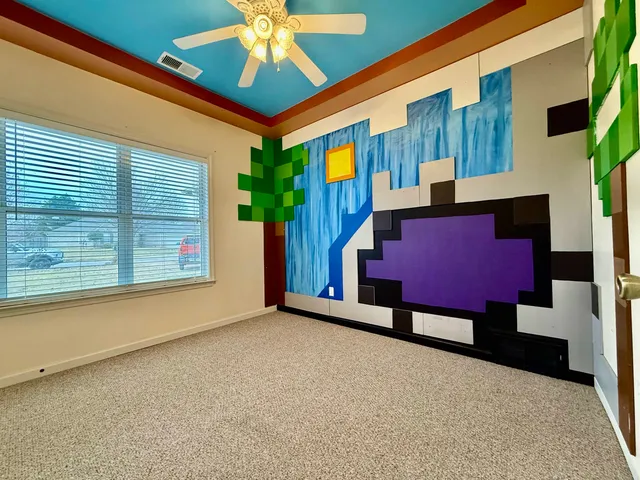 a bathroom with a double vanity sink toilet and a mirror