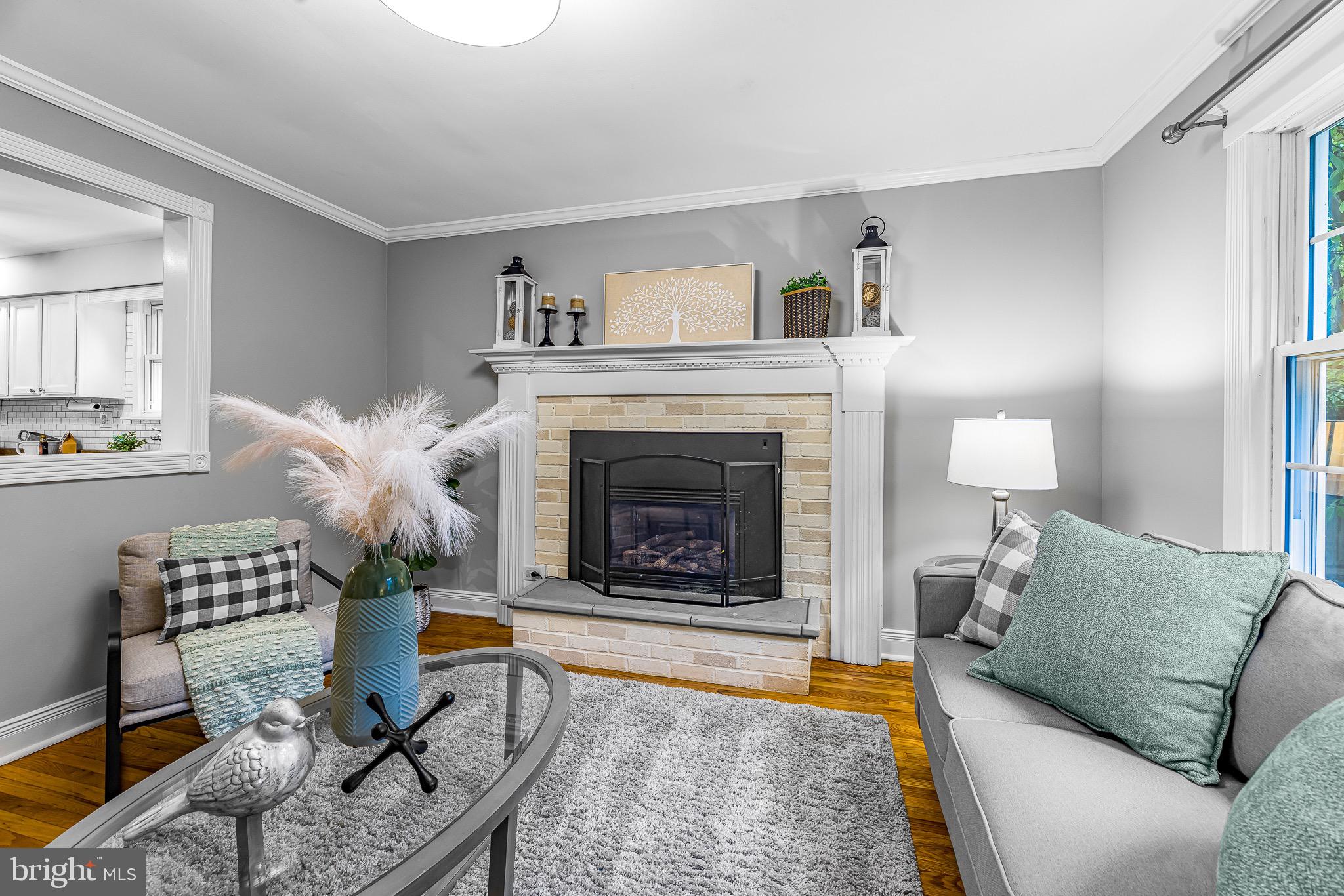 13 Winter Street Media, PA 19063 - Photo 8 of 41 a living room with furniture and a fireplace