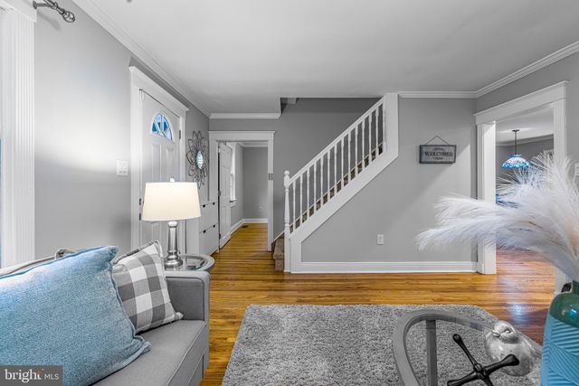 a view of living room and dining room