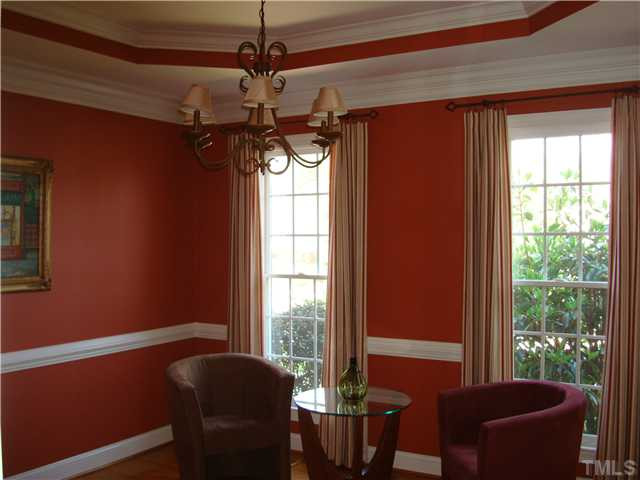 Dining room has trey ceiling, recently updated chandelier remains.