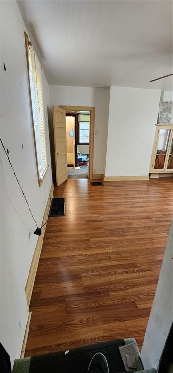 901 6th Street Braddock, PA 15104 - Photo 15 of 25 a view of a room with wooden floor and staircase