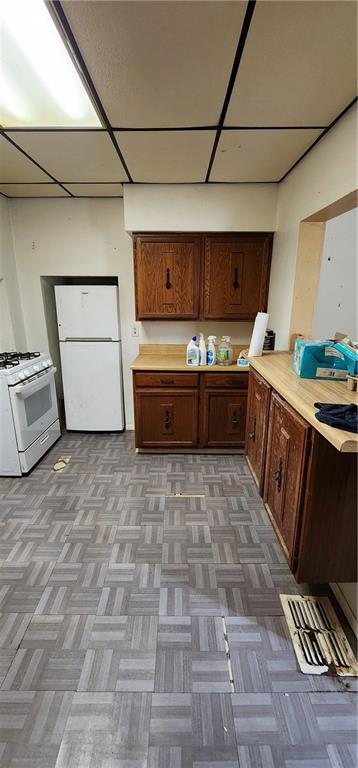 901 6th Street Braddock, PA 15104 - Photo 19 of 25 a kitchen with a stove and a refrigerator