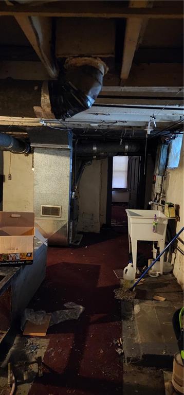 901 6th Street Braddock, PA 15104 - Photo 22 of 25 a living room with lots of furniture and appliances