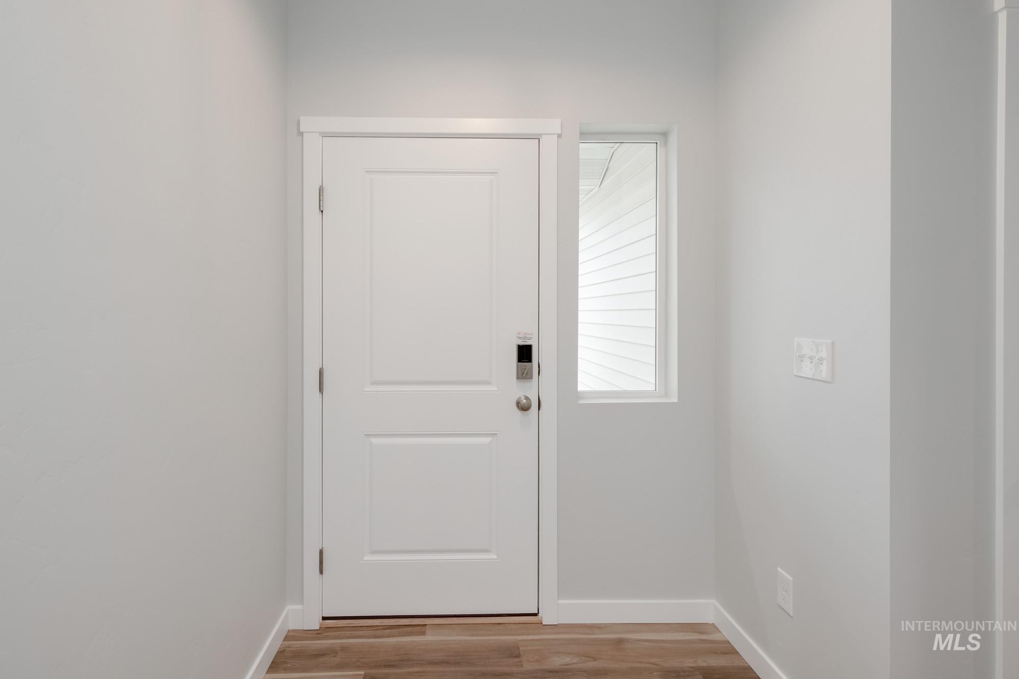 1576 Long Pond Street Middleton, ID 83644 - Photo 3 of 22 Entryway with wood finished floors and baseboards