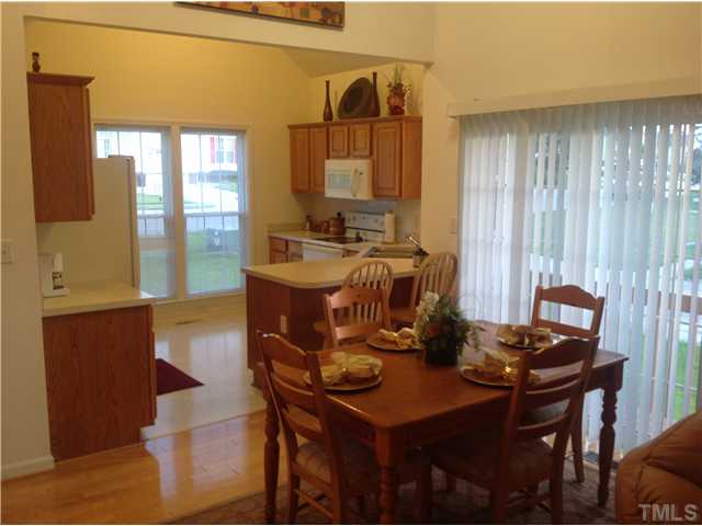 7129 Spanglers Spring Way Raleigh, NC 27610 - Photo 18 of 19 a room with furniture and window