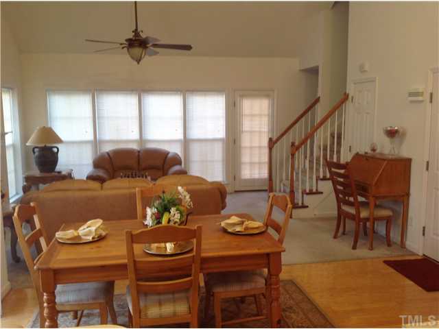 7129 Spanglers Spring Way Raleigh, NC 27610 - Photo 7 of 19 a living room with furniture and a window