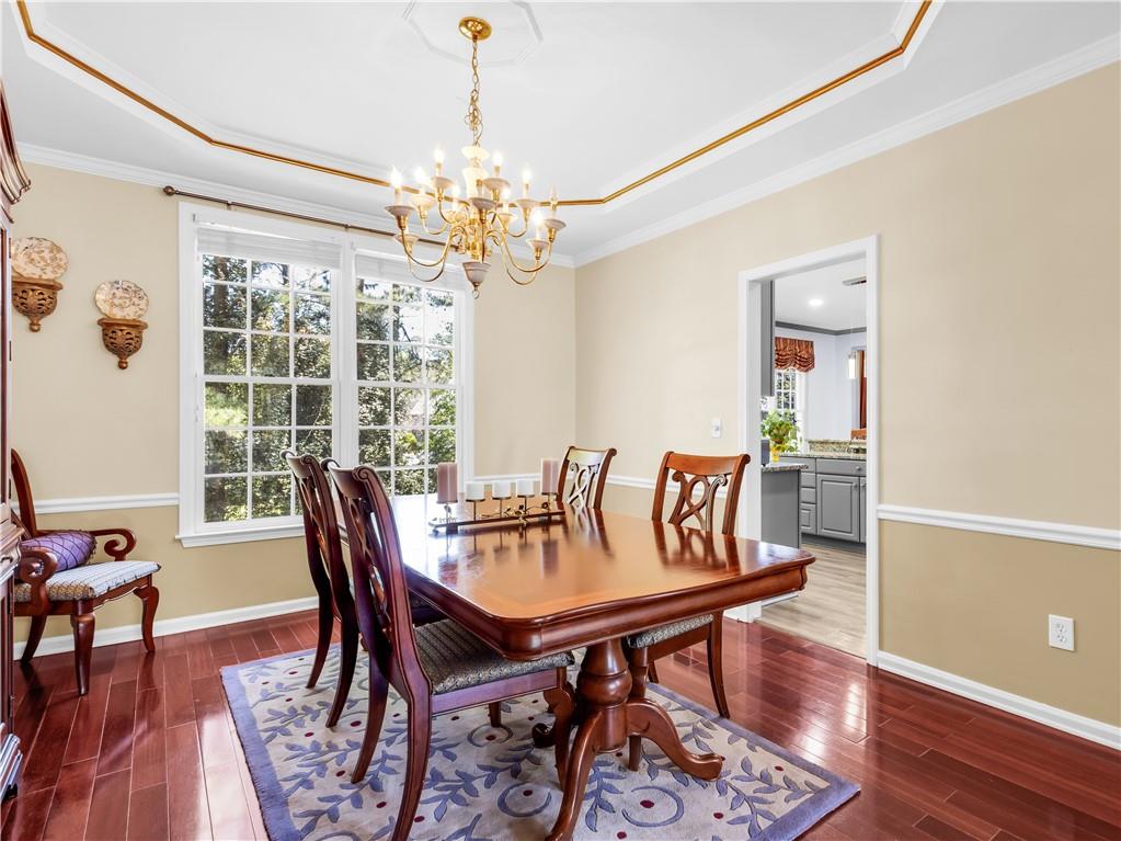 2354 Brentmoore Point Conyers, GA 30013 - Photo 14 of 91 a view of a dining room with furniture window and wooden floor
