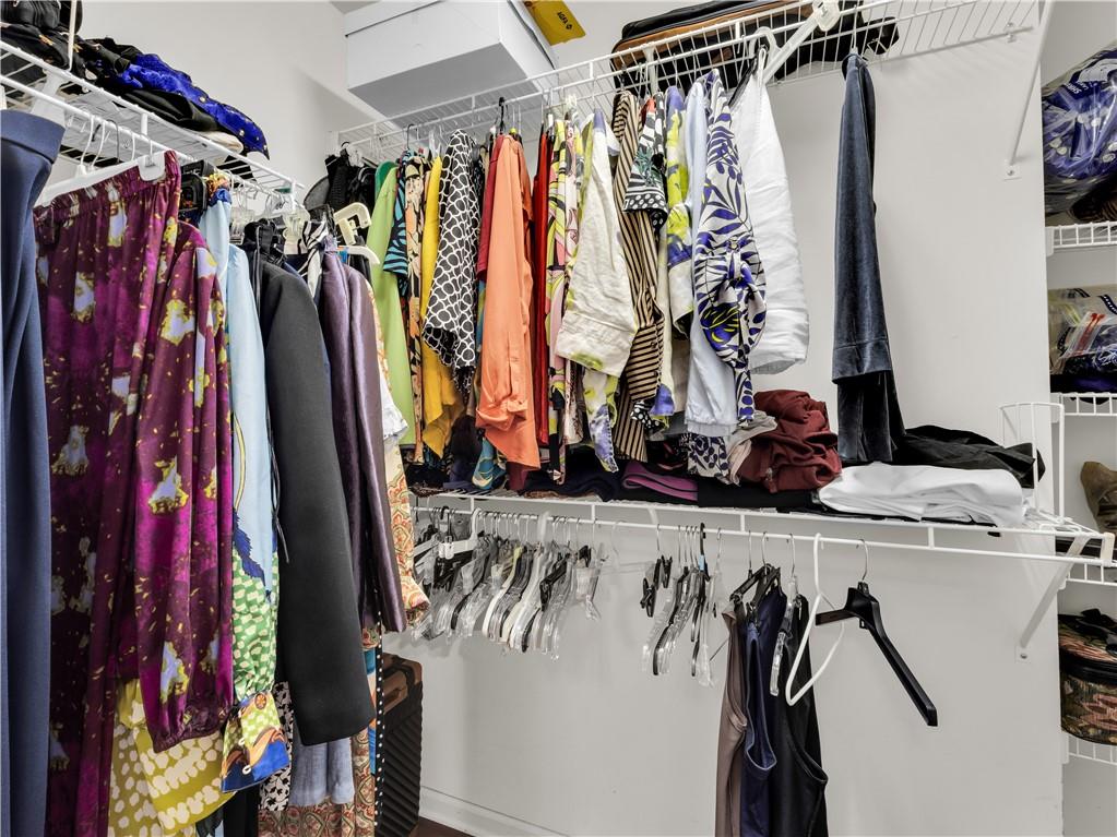 2354 Brentmoore Point Conyers, GA 30013 - Photo 46 of 91 a view of walk in closet with clothes