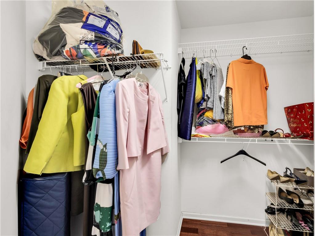 2354 Brentmoore Point Conyers, GA 30013 - Photo 47 of 91 a view of walk in closet with clothes and shoes