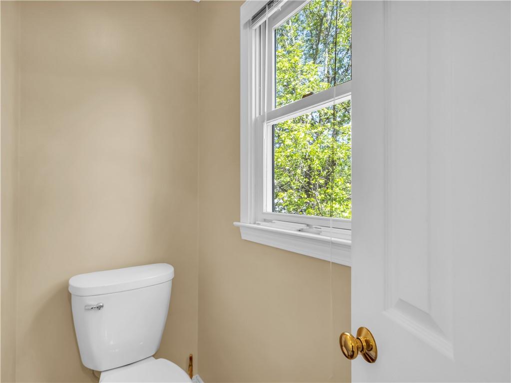 2354 Brentmoore Point Conyers, GA 30013 - Photo 56 of 91 a bathroom with a toilet and a sink