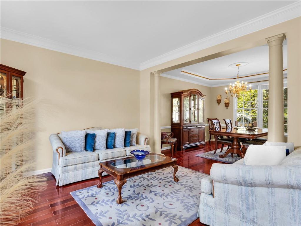 2354 Brentmoore Point Conyers, GA 30013 - Photo 9 of 91 a living room with furniture and a large window