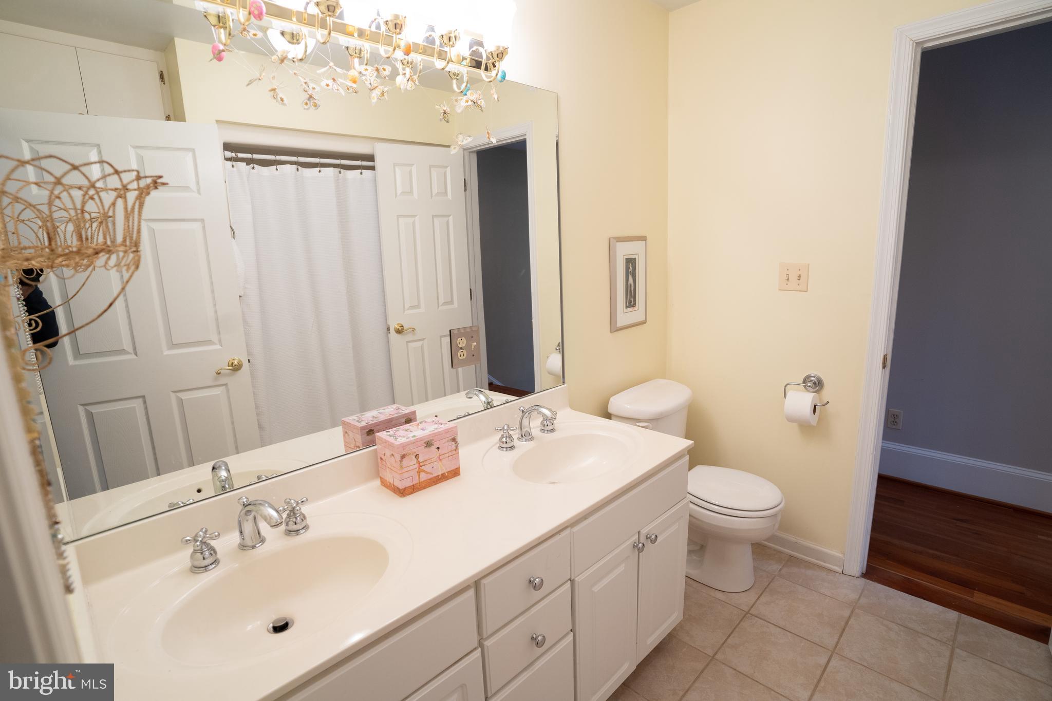8009 Custer Road Bethesda, MD 20814 - Photo 20 of 24 Hallway Jack and Jill Full Bath