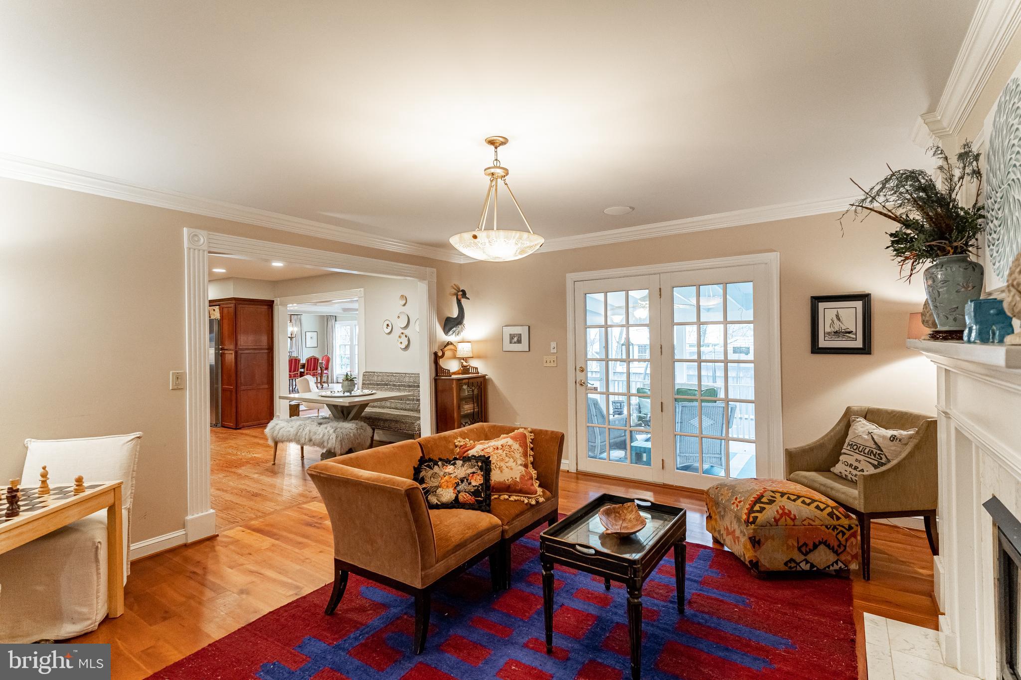 8009 Custer Road Bethesda, MD 20814 - Photo 8 of 24 Den w/ Access to Screened Porch