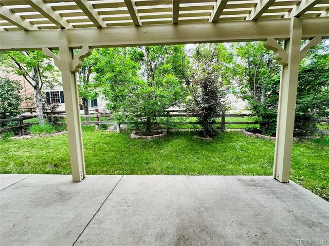 a view of a golf course with a garden