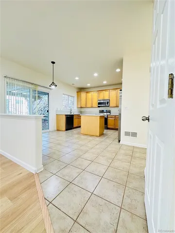 a view of empty room with windows