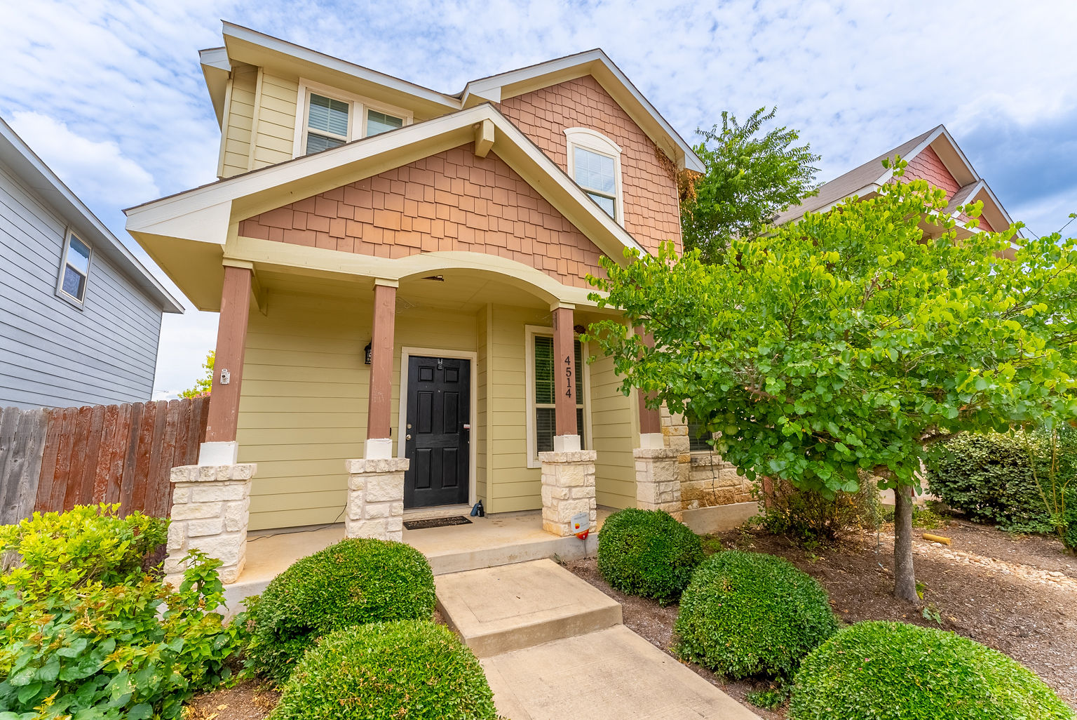 4514 Senda Lane Austin, TX 78725 - Photo 1 of 25 a front view of a house with garden