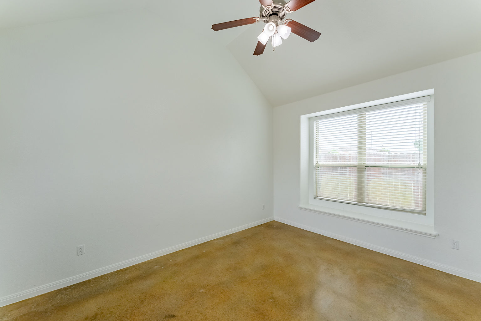 4514 Senda Lane Austin, TX 78725 - Photo 13 of 25 an empty room with a window