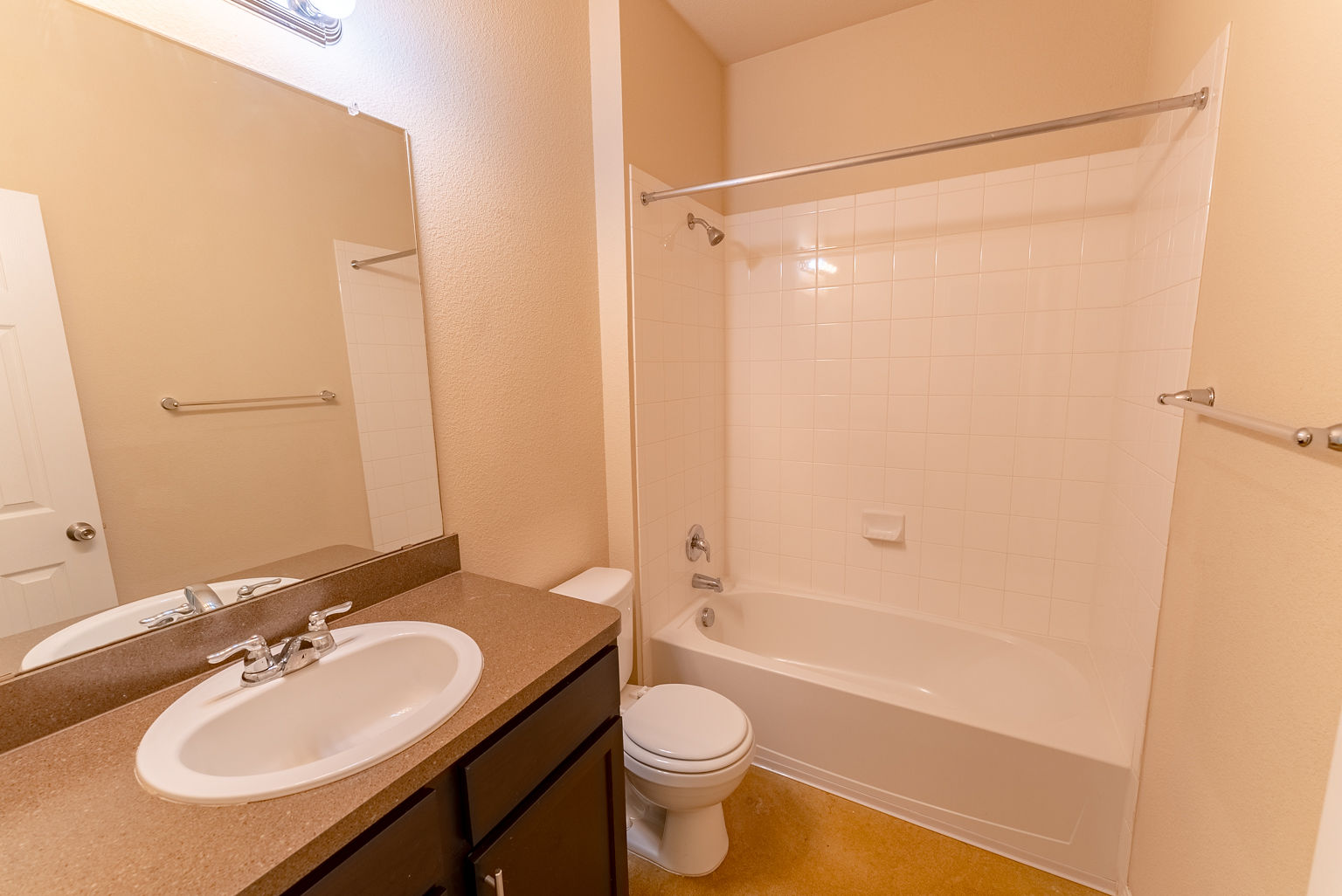 4514 Senda Lane Austin, TX 78725 - Photo 8 of 25 a bathroom with a sink a toilet and shower