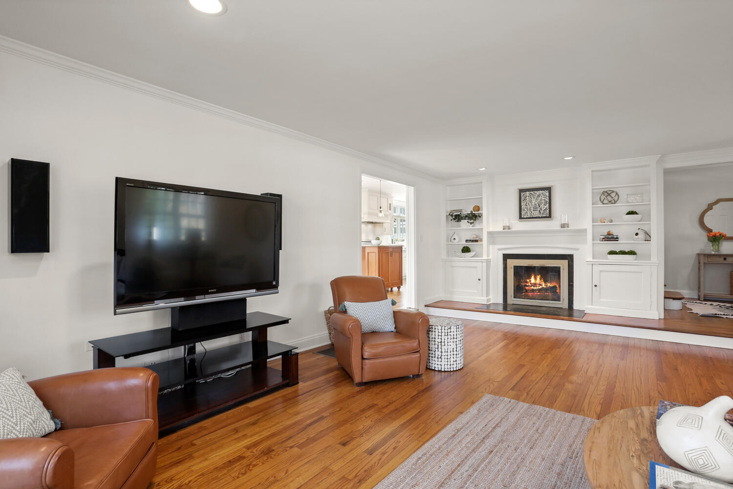 28 Relihan Road Darien, CT 06820 - Photo 11 of 40 a living room with furniture and a flat screen tv