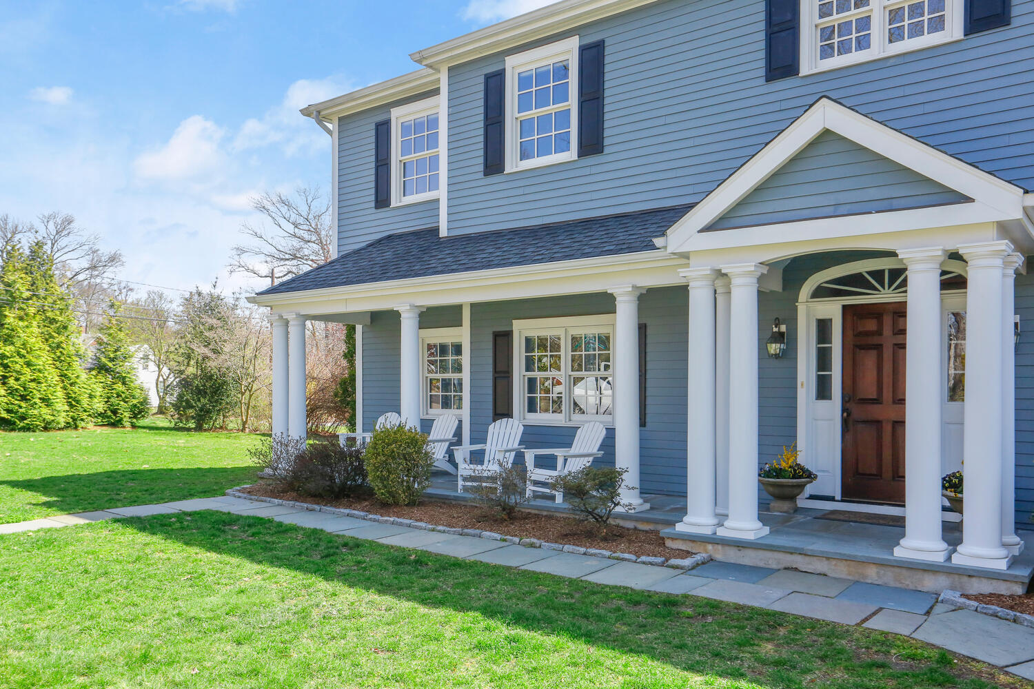 28 Relihan Road Darien, CT 06820 - Photo 3 of 40 a front view of a house with garden