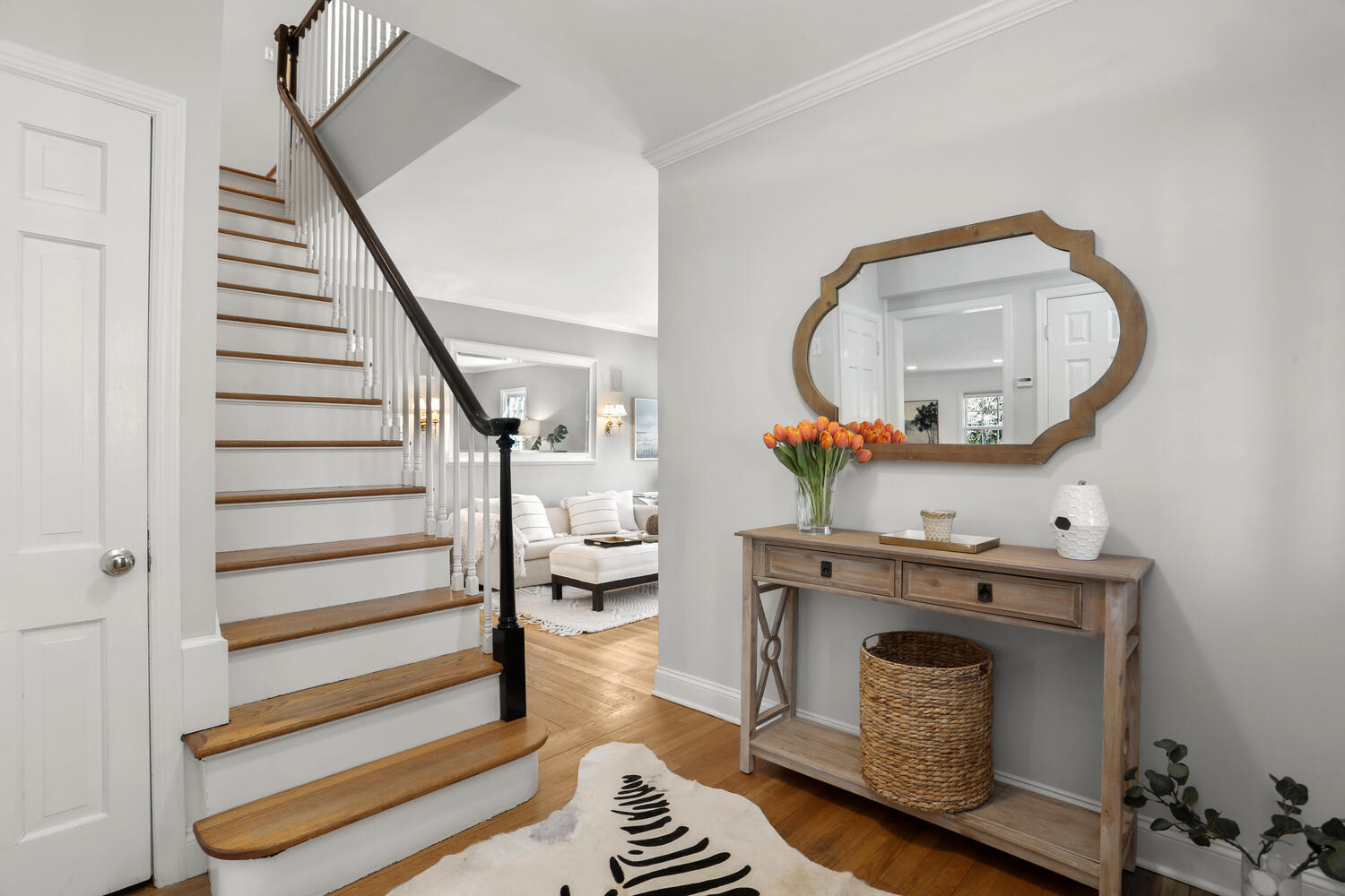 28 Relihan Road Darien, CT 06820 - Photo 4 of 40 a view of a livingroom with furniture and staircase