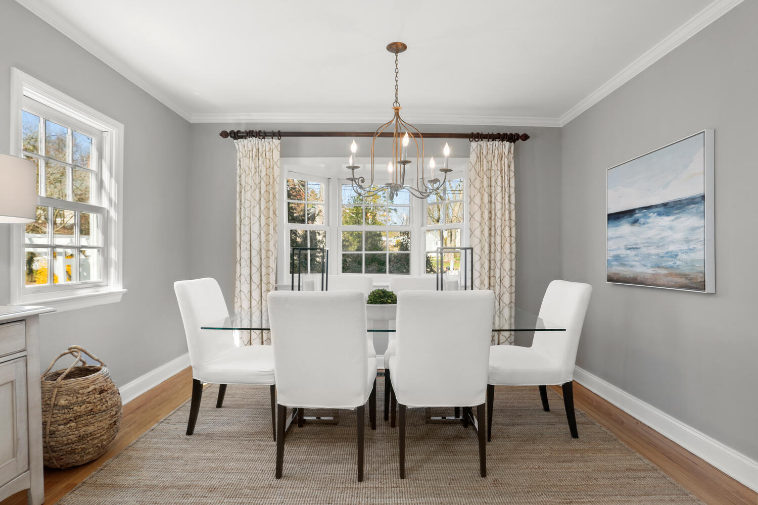 28 Relihan Road Darien, CT 06820 - Photo 8 of 40 a dining room with furniture a chandelier and wooden floor