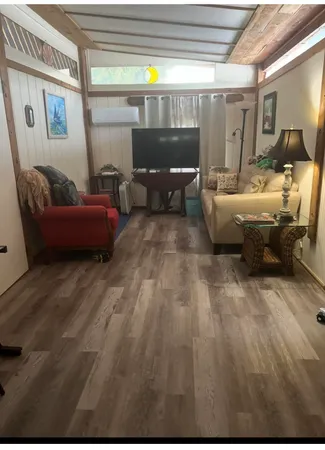 a living room with furniture and a couch