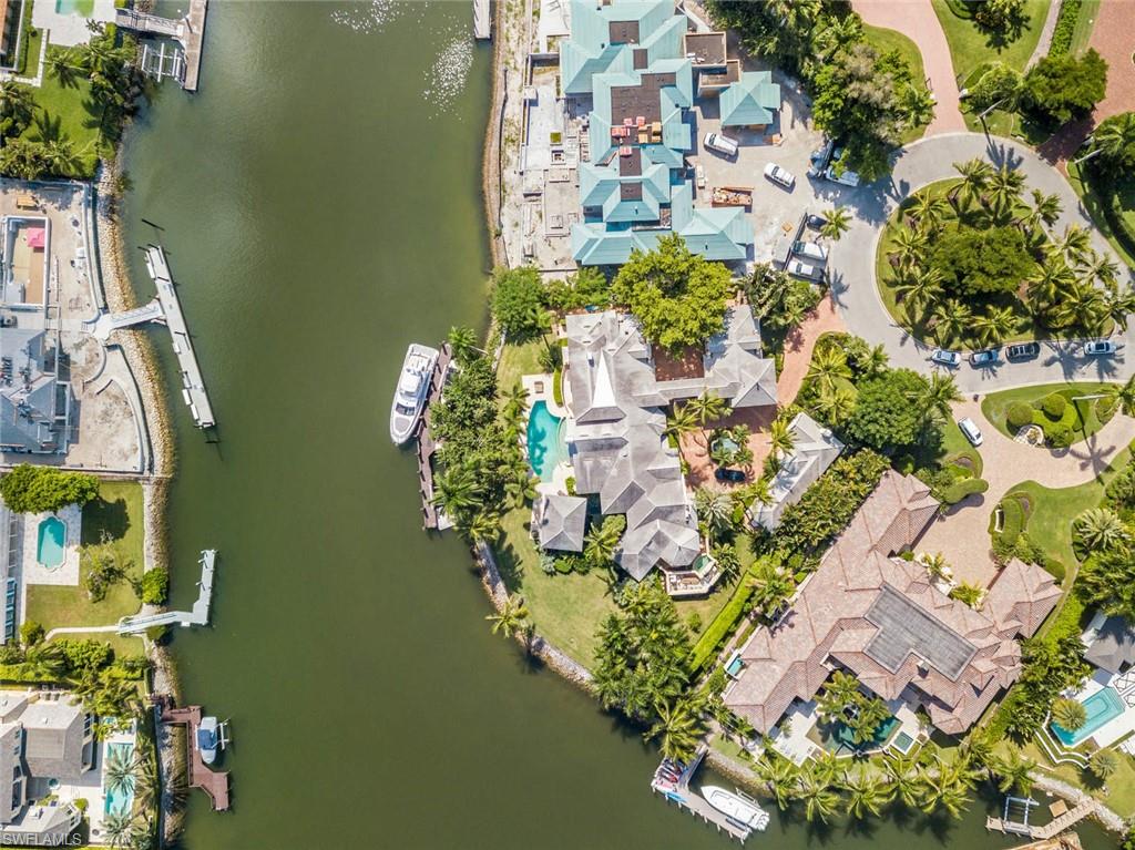 3275 Green Dolphin Lane Naples, FL 34102 - Photo 2 of 35 an aerial view of a house with a lake view
