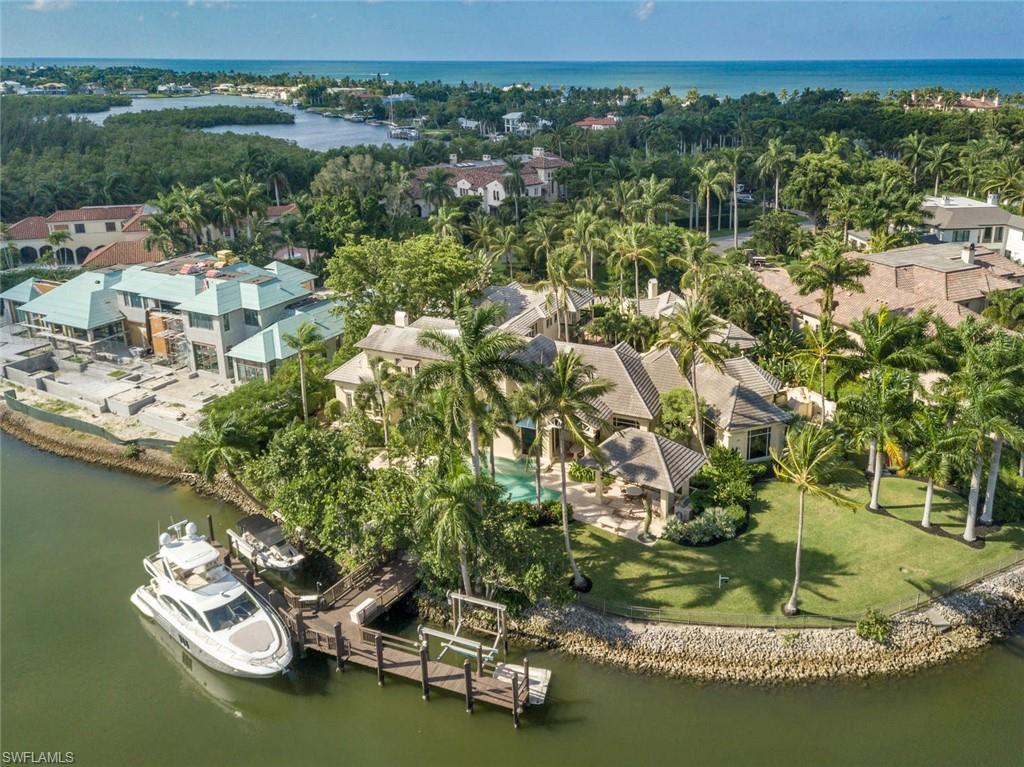 3275 Green Dolphin Lane Naples, FL 34102 - Photo 34 of 35 a view of a lake with houses